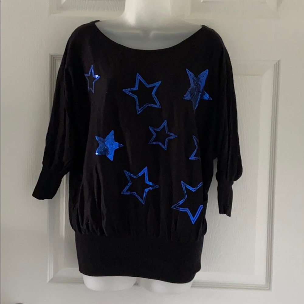 Black sweater with stars